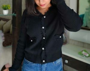 Elegant Black Cardigan with Details