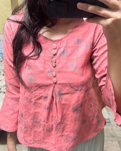 Peach peplum top