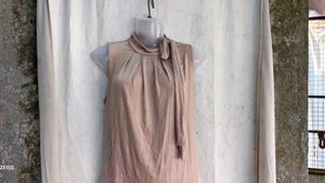 16810. Elegant Sleeveless Blouse with Neck Tie