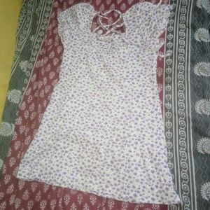 A white-lavender floral mini day out dress