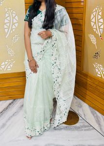 Elegant Light Green Saree with Embroidered Blouse