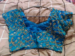 Designer Blue Embroidered Blouse  has margin