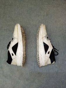 Stylish White and Black Sneakers