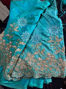 Beautiful Teal Embroidered saree with 34inch blous