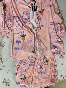 Pink Pajama Set with Cute Print 🧞‍♀️