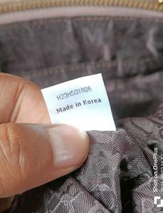 brand is bruno magli OG Stylish Taupe Faux Leather