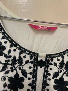 Elegant White Kurta with Black Embroidery