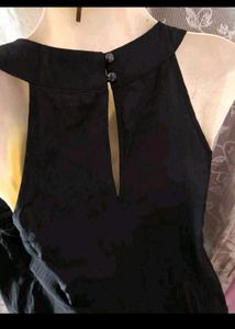 Elegant Black Jumpsuit with Embellished Neckline