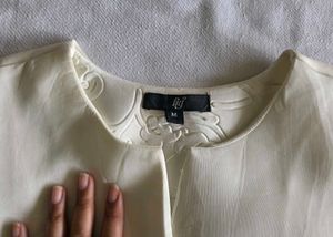 Cream Textured Fit and Flare Dress