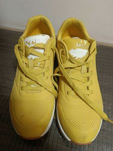 Yellow Skechers Sneakers