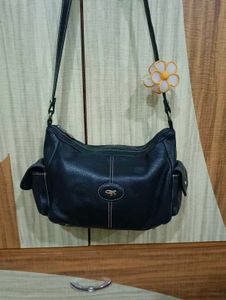 Chic Navy Leather Shoulder Bag with Flower Accent