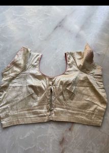 Elegant Golden Saree with Pink Embroidery