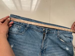 Distressed Blue Denim Jeans