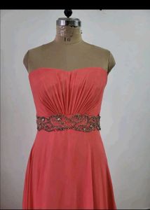 Elegant Strapless Coral Gown with Embellished Wais