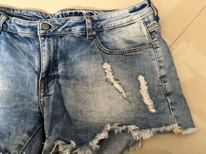 Distressed Light Wash Denim Shorts