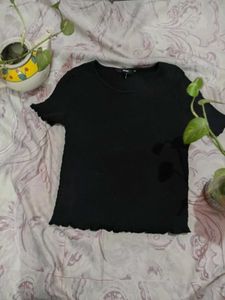 Chic Black Smocked Lettuce-Trim Tee | Textured Cro