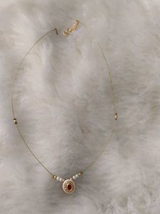 Delicate Gold Necklace with Red Stone