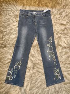 Whimsical Floral Embroidered Denim Jeans