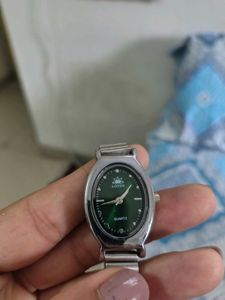 Elegant Oval Green Dial Watch