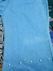 flared jeans with pearl