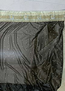 Grand netted tan and coffee brown saree