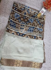 Sage green saree with geometric designs and blouse