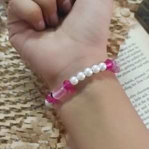 Cute Looking Bracelet In Pink And White Colour