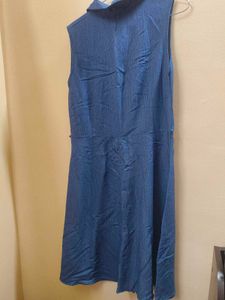 A denim dress sleeveless