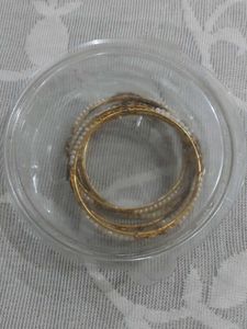 Elegant Gold Tone Bangles with Pearl Accents