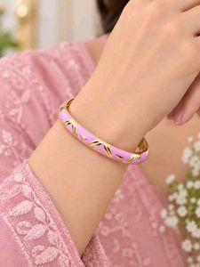 Elegant Gold and Lavender Bangle