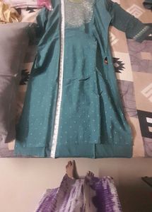 Teal Kurta with Intricate Neck Embroidery and mela