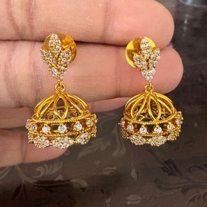 Elegant Gold Jhumka Earrings with Stones
