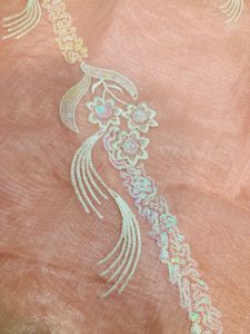 Elegant Peach Saree with Delicate Embroidery