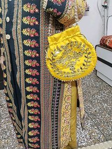 Vibrant Yellow Embroidered Potli Bag