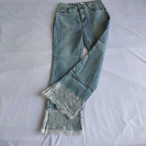 Light Wash Flared Jeans with Lace Trim