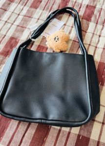Stylish Black Hobo Bag with Charm