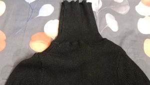 Black Ribbed Turtleneck Sweater