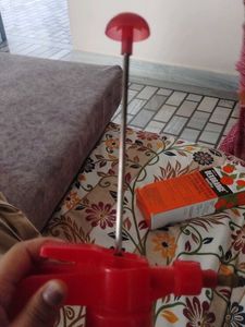 Red Spray Bottle for cleaning windows