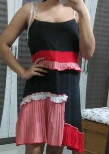 Black Dress With Colorful Ruffle Details