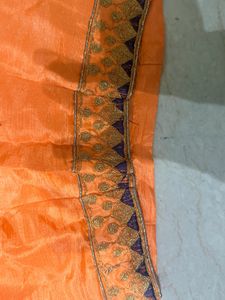 Orange Lehenga Choli with Blue Dupatta