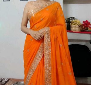 Vibrant Orange Embroidered Saree