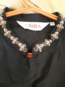 Elegant Black Embroidered Tunic Top