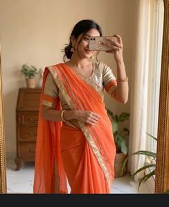 Elegant Orange Saree with Golden Border