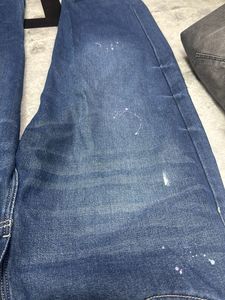 Distressed Blue Denim Jeans