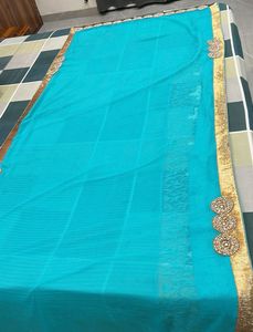 Beautiful Teal Blue Saree with Gold Border