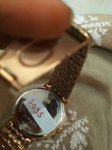 Elegant Titan Gold Watch