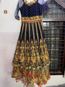long heavy tail cut dress with intricate embroider