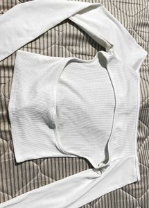 Off-Shoulder White Top with Bow Detail