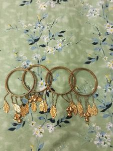 Elegant Gold-Toned Bangle Set with Leaf Charms