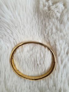 Elegant Gold Bangle with Crystals